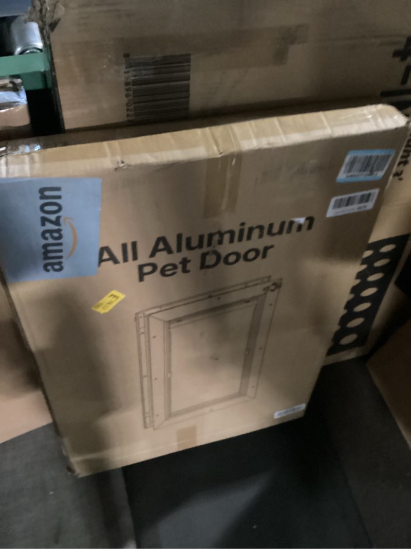 Condition photo showing Good Condition for all aluminum xl dog door for exterior door, extra large dog door, heavy duty pet door, double magnetic flaps, thermal tnsulation, energy efficient, sliding lock panel (pets up to 220lb)