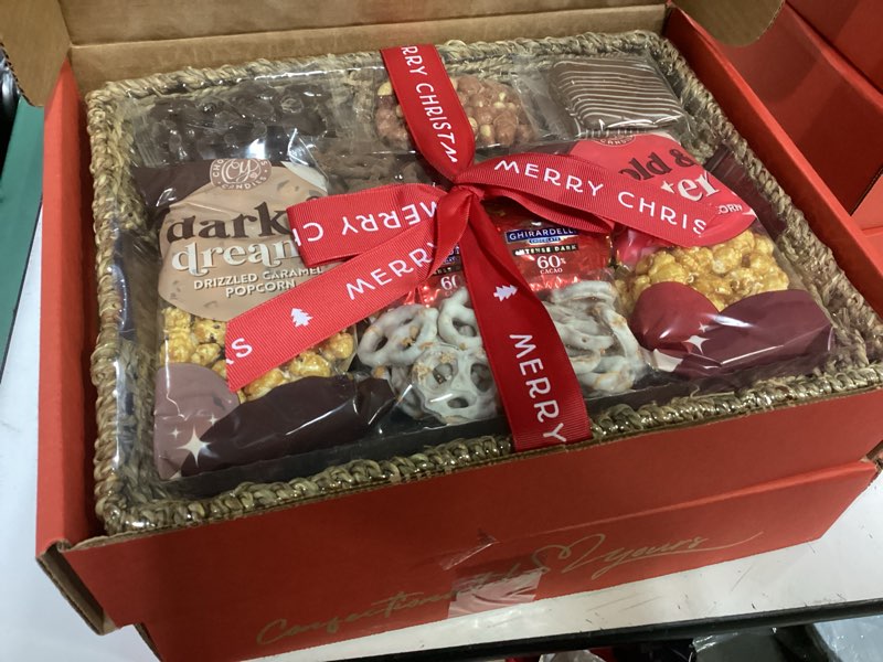 Condition photo showing New/Like New for (bbd 09/25/26)a gift inside chocolate, caramel and crunch grand gift basket original chocolate 32 ounce (pack of 1)