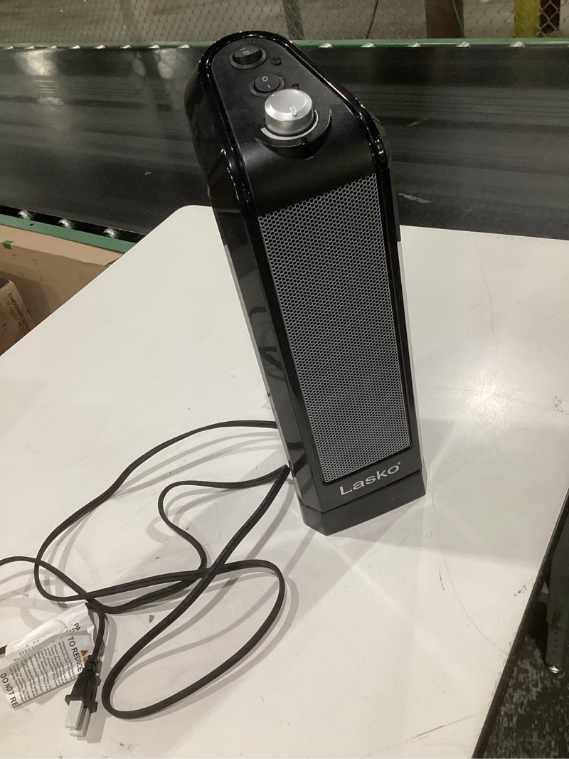 Condition photo showing Good Condition for (not tested)lasko ct16450 15.7 inches, portable 1500w oscillating electric ceramic space heater with manual thermostat and overheat safety protection for indoor home use
