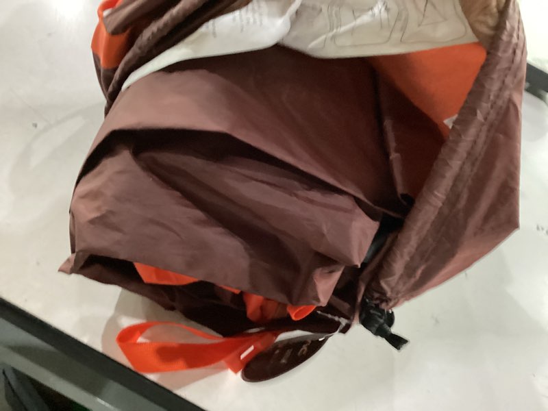 Condition photo showing As Is for marmot midpines 4-person tent | weather-resistant and durable, red sun/picante