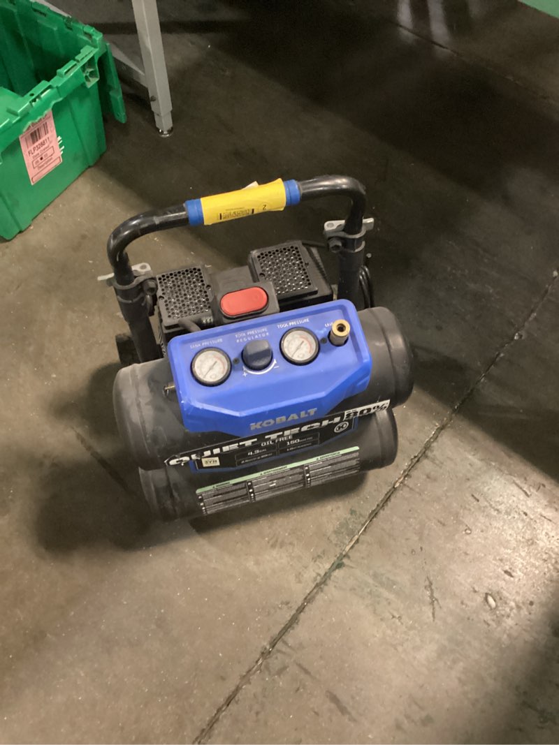 Condition photo showing As Is for kobalt quiet tech 4.3-gallon portable 150 psi twin stack air compressor (model 3320447