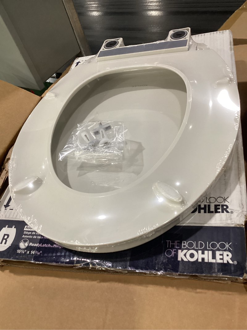 Condition photo showing New/Like New for kohler 4639-rl-ny cachet readylatch round toilet seat soft close, dune dune round ready latch