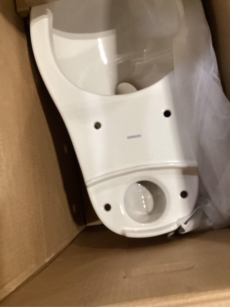 Condition photo showing Good Condition for gerber maxwell choice 12 in. rough-in 2 piece 1.28 gpf single flush round chair height toilet in white with soft close seat