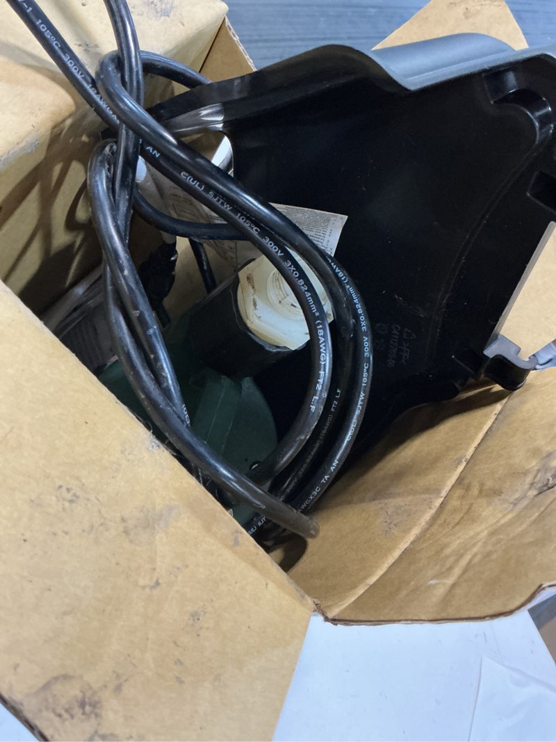 Condition photo showing As Is for zoeller 1/3 hp 2100 gph thermoplastic electronic switch bottom ac submersible utility pump