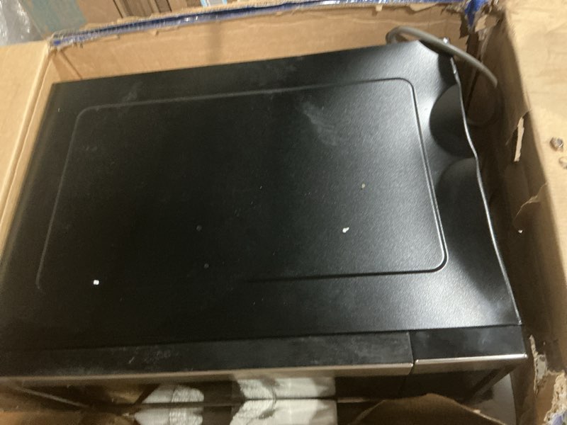 Condition photo showing As Is for GE Countertop Microwave Oven, 1,150-watt Capacity, 1.6 Cubic Ft., 8 Auto Setting Cooking Settings, Child-Lock Technology, Kitchen Essentials for the Countertop, Dorm Room or Apartment, Stainless Steel 1.6 Cu.Ft. Stainless Steel