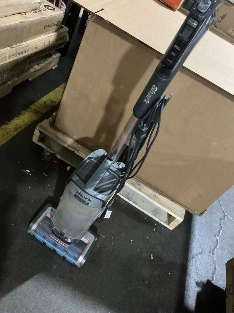Condition photo showing As Is for powers on shark az2002 vertex powered lift-away upright vacuum with duoclean powerfins, self-cleaning brushroll, large dust cup, pet crevice tool, dusting brush & power brush, silver/rose gold duoclean powerfin (rose gold)