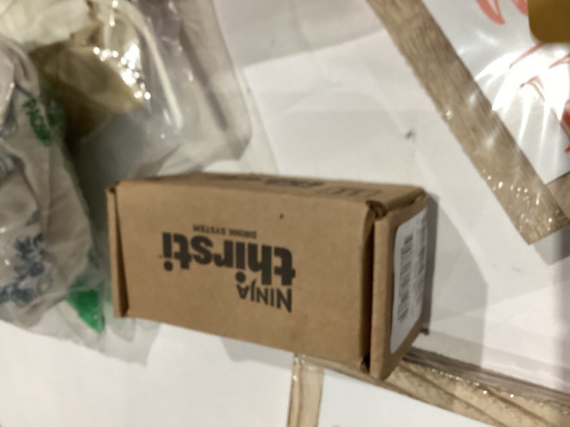 Condition photo showing New/Like New for Ninja Thirsti Flavored Water Drops, FRUITI CHILL Tropical Pineapple, Bold Fruit Flavor, Sparkling or Still, Zero Calories, Zero Sugar, Makes 17, 12oz drinks, 3 Pack, WCFTRCCAM