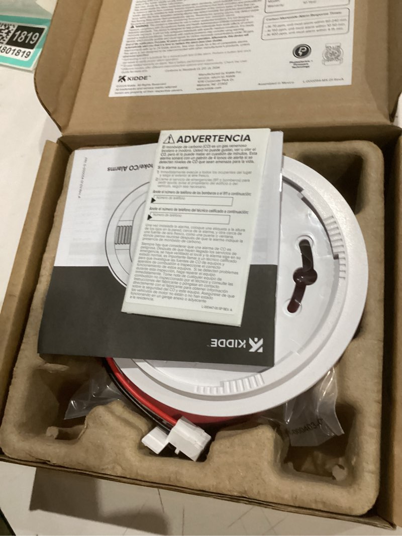 Condition photo showing As Is for kidde hardwired smoke & carbon monoxide detector, 10-year battery backup, voice alerts, interconnectable led warning light indicators 1 pack