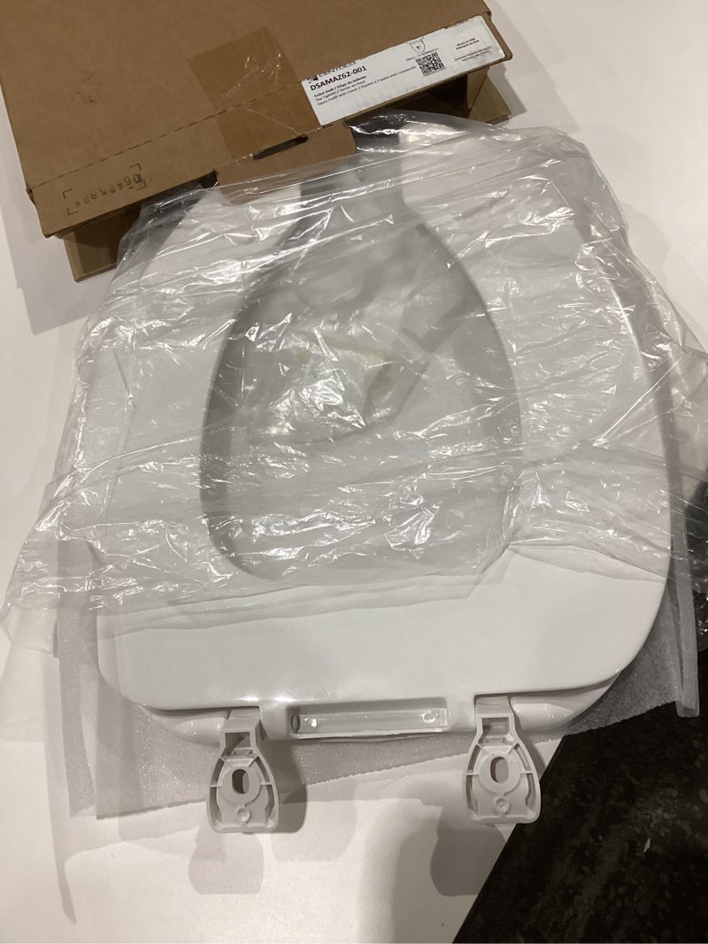 Condition photo showing Good Condition for Centoco Elongated Toilet Seat,Closed Front with Cover, Residential, Plastic, Made in the USA, 1600-001, White White Elongated Residential, SIMILAR TO STOCK PHOTO 