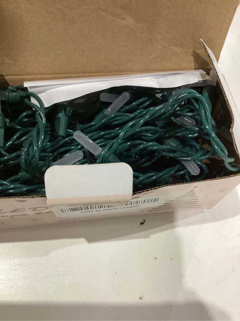 Condition photo showing Good Condition for LED Christmas Lights Indoor Outdoor, 16.4 FT 50 LED Warm White String Lights Green Wire, Connectable Waterproof Christmas Tree Light Plug in for Xmas Garland Wreath Holiday Wedding Decorations Warm White 50 LED