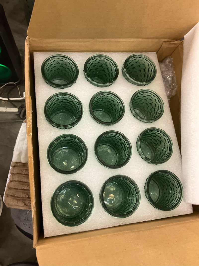 Condition photo showing New/Like New for Maxdot 48 Pack Green Glass Votive Candle Holders 2.1 x 2.6 Inch St. Patrick's Day Tea Light Candleholder Bulk Xmas Glass Tealight Candlestick Holders for Table Centerpiece Home Wedding Party Decor
