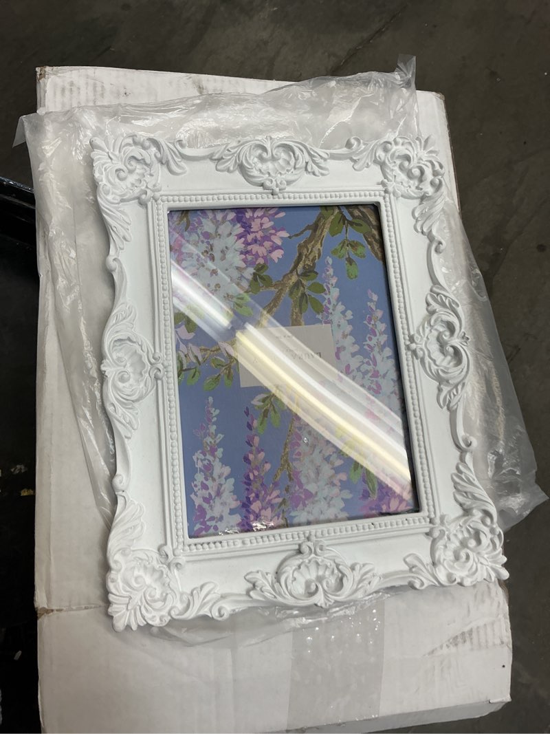 Condition photo showing As Is for Laura Ashley 5x7 White Ornate Textured Hand-Crafted Resin Picture Frame with Easel & Hook for Tabletop & Wall Display, Decorative Floral Design Home Décor, Photo Gallery, Art, More (5x7, White)