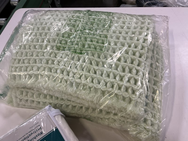 Condition photo showing Good Condition for miulee set of 2 waffle bathroom rugs, boho bath rugs non slip washable, super absorbent bath mats, ultra soft rubber backed shower mats for bathroom floor, tub and shower, sage green, 18x30 inch sage green waffle 18''x30''