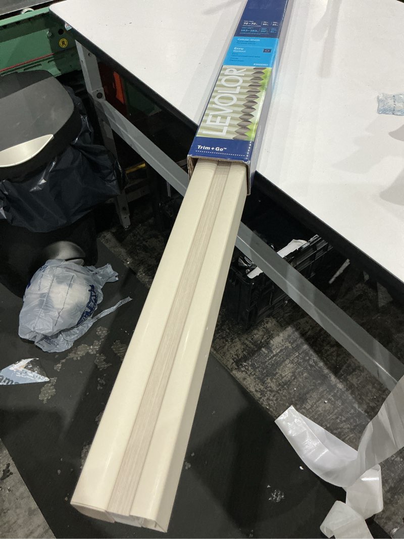 Condition photo showing As Is for levolor 72-in x 72-in ecru blackout cordless cellular shade