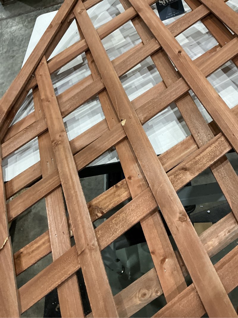 Condition photo showing As Is for style selections 24.02-in w x 72.05-in h brown wood garden trellis