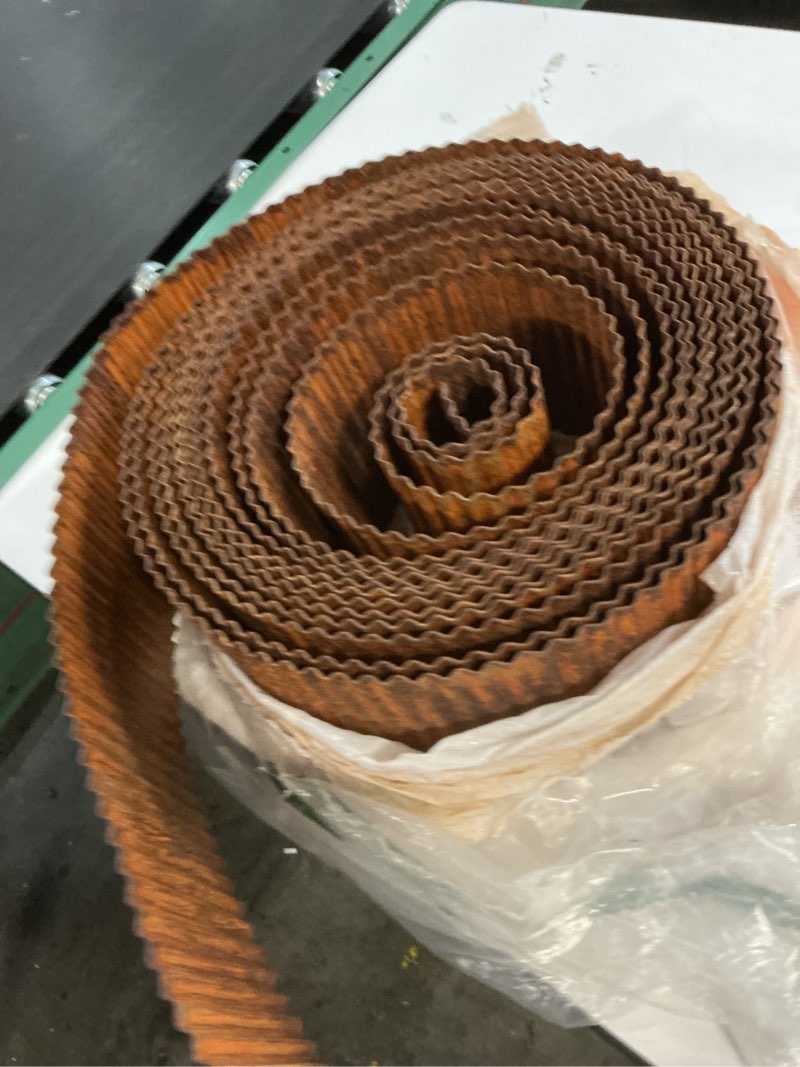 Condition photo showing As Is for LAVEVE Corrugated Metal Garden Edging 6\" x 40Ft, Landscape Edging Border for Lawn, Flower Bed, Garden Fence, Paver Edging (Real Rusted) (similar). 