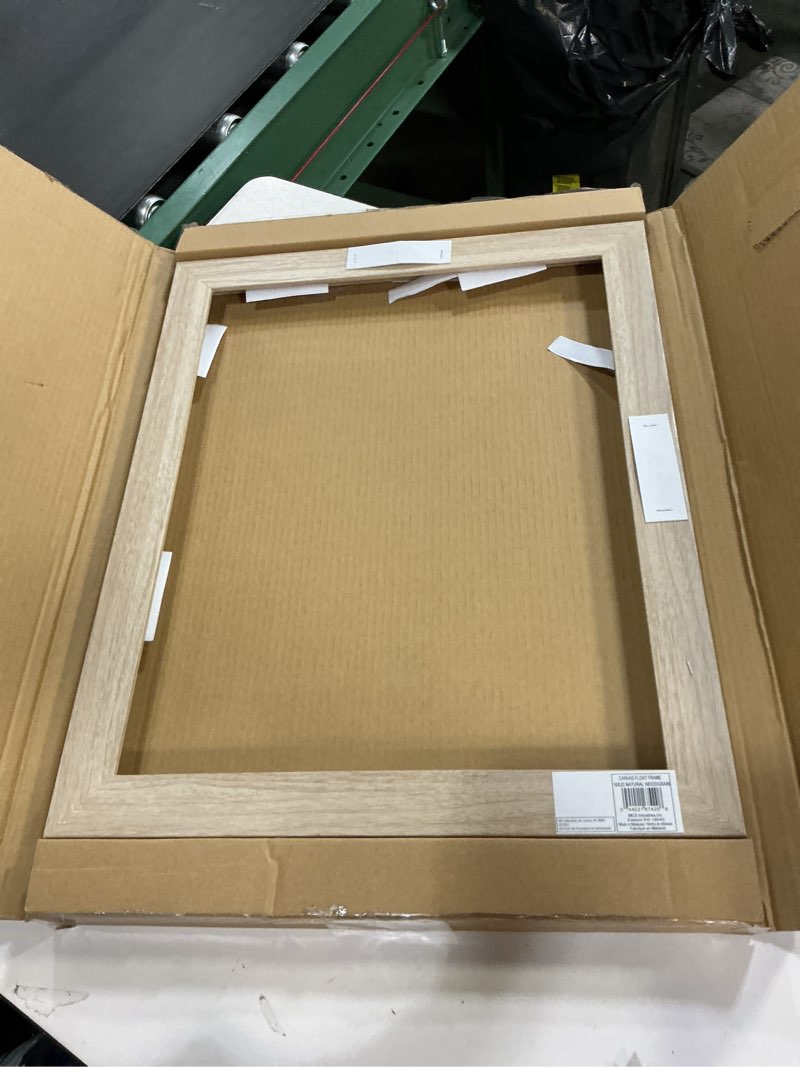 Condition photo showing Good Condition for MCS Canvas Float Frames 16x20 Frame, Natural Woodgrain for Finished Canvases, Vertical & Horizontal Wall Hanging Large with Adhesive for Canvas Paintings (1-Pack) 16x20 without Mat Natural Woodgrain