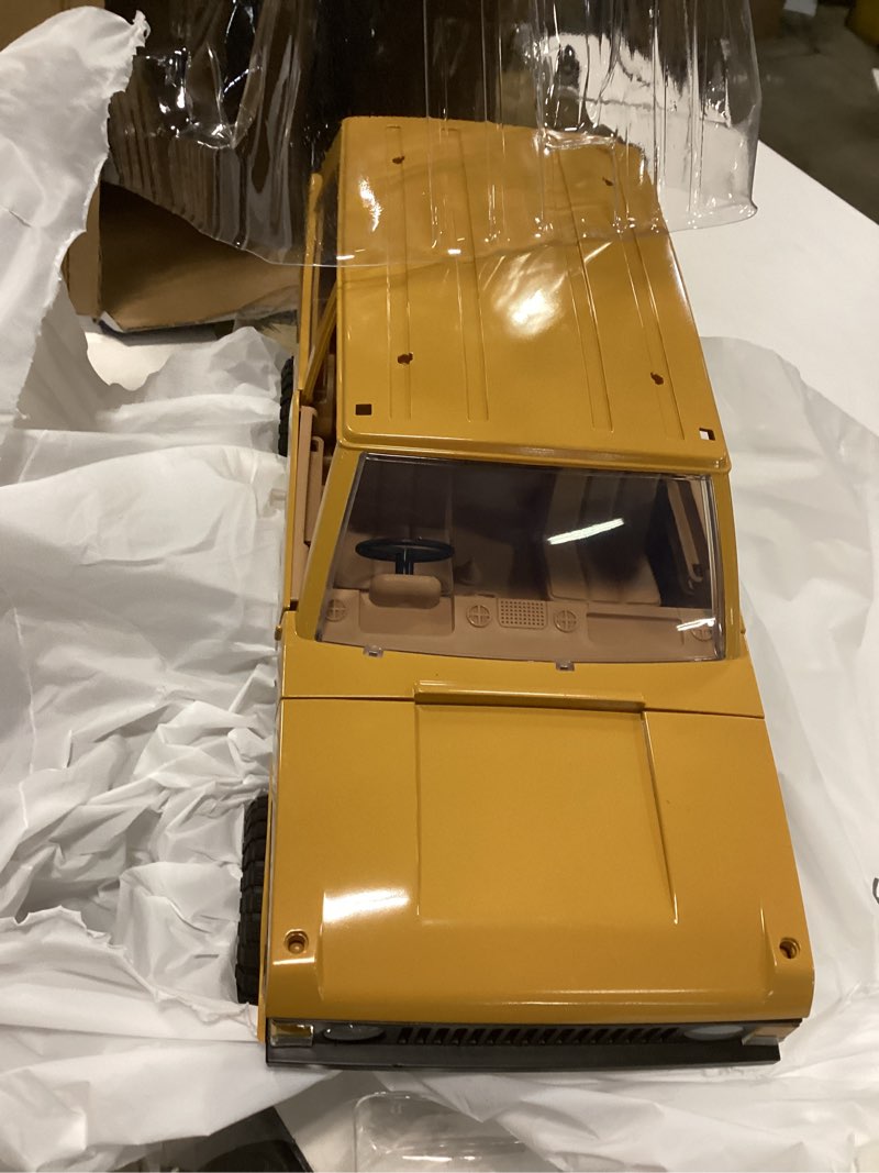 Condition photo showing Good Condition for RC Crawler MN168,1/12 Scale Truck,2.4Ghz Toyota Remote Control Car, 4WD 2 Speeds Switch RC Crawler Off-Road Pick-up Equipped with 2 Rechargeable Batterie(Yellow)