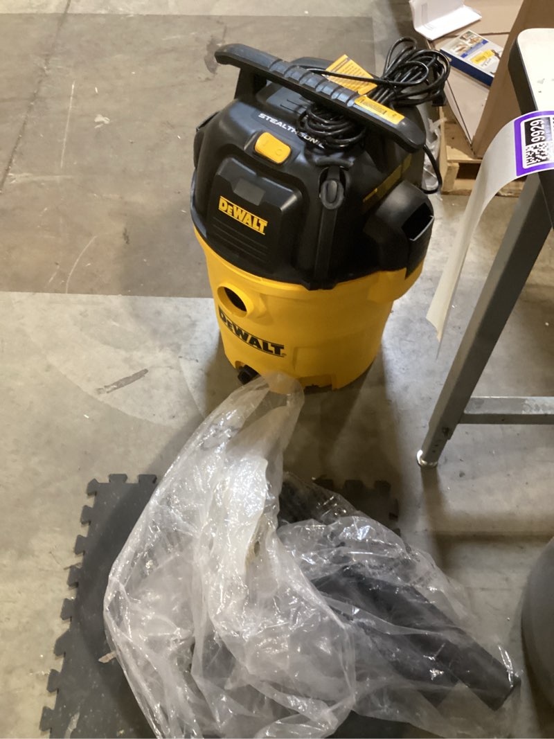 Condition photo showing As Is for dewalt stealthsonic quiet 12-gallon 5.5 hp corded wet/dry shop vacuum with accessories
