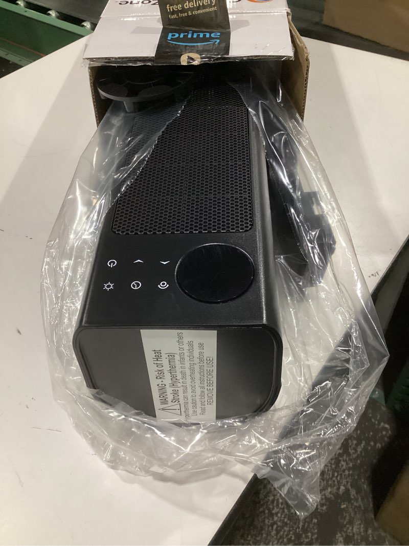 Condition photo showing Good Condition for (not tested)comfort zone 30  oscillating tower space heater with remote control for indoor use  digital adjustable thermostat  timer  lcd display  safety tip over switch  overheat protection  1500w  mt1030