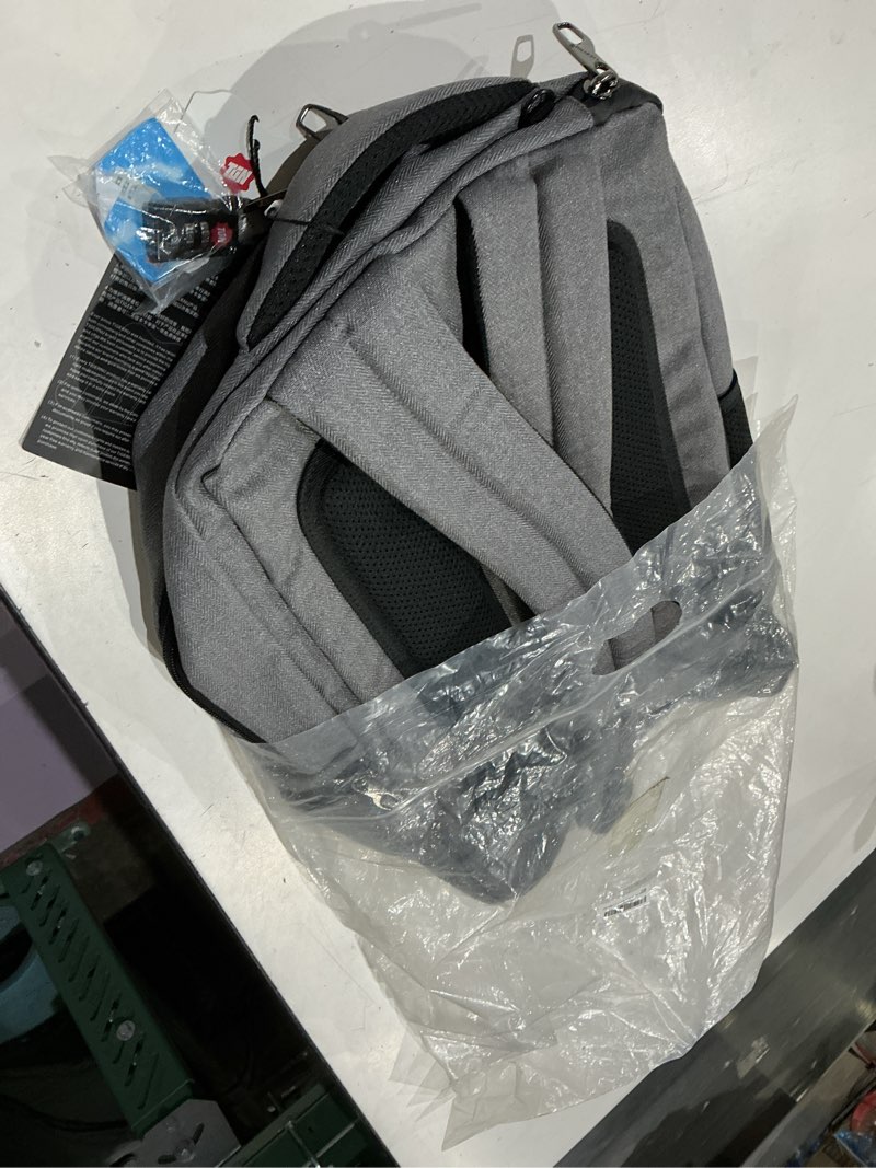 Condition photo showing As Is for 15.6 anti theft water resistant laptop backpack bag lightweight business bag