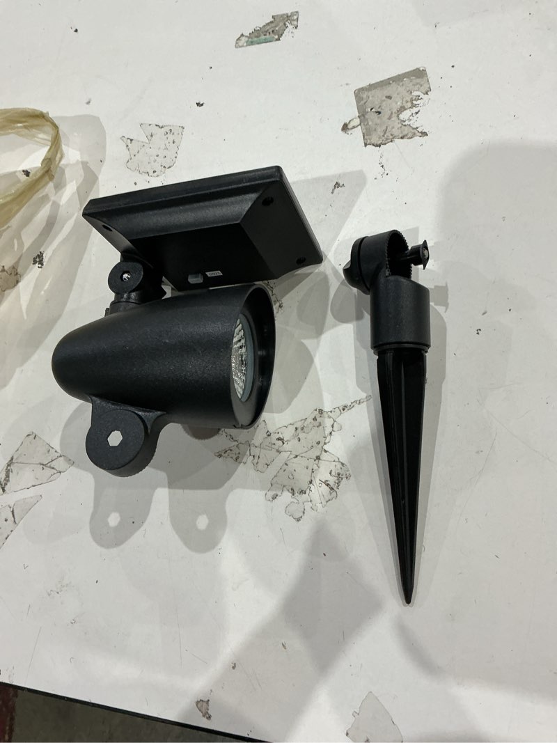 Condition photo showing As Is for harbor breeze 60 -lumens 1 -watt black warm white solar led spot light
