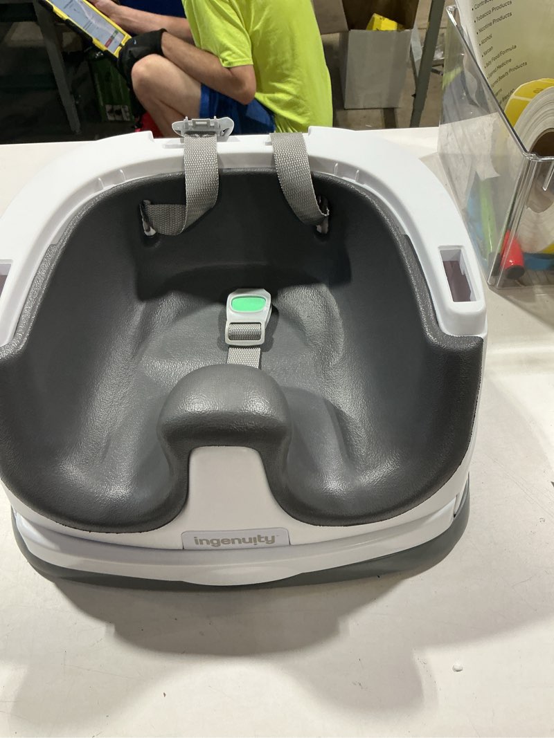 Condition photo showing As Is for ingenuity baby base 2-in-1 booster feeding and floor seat with self-storing tray - slate