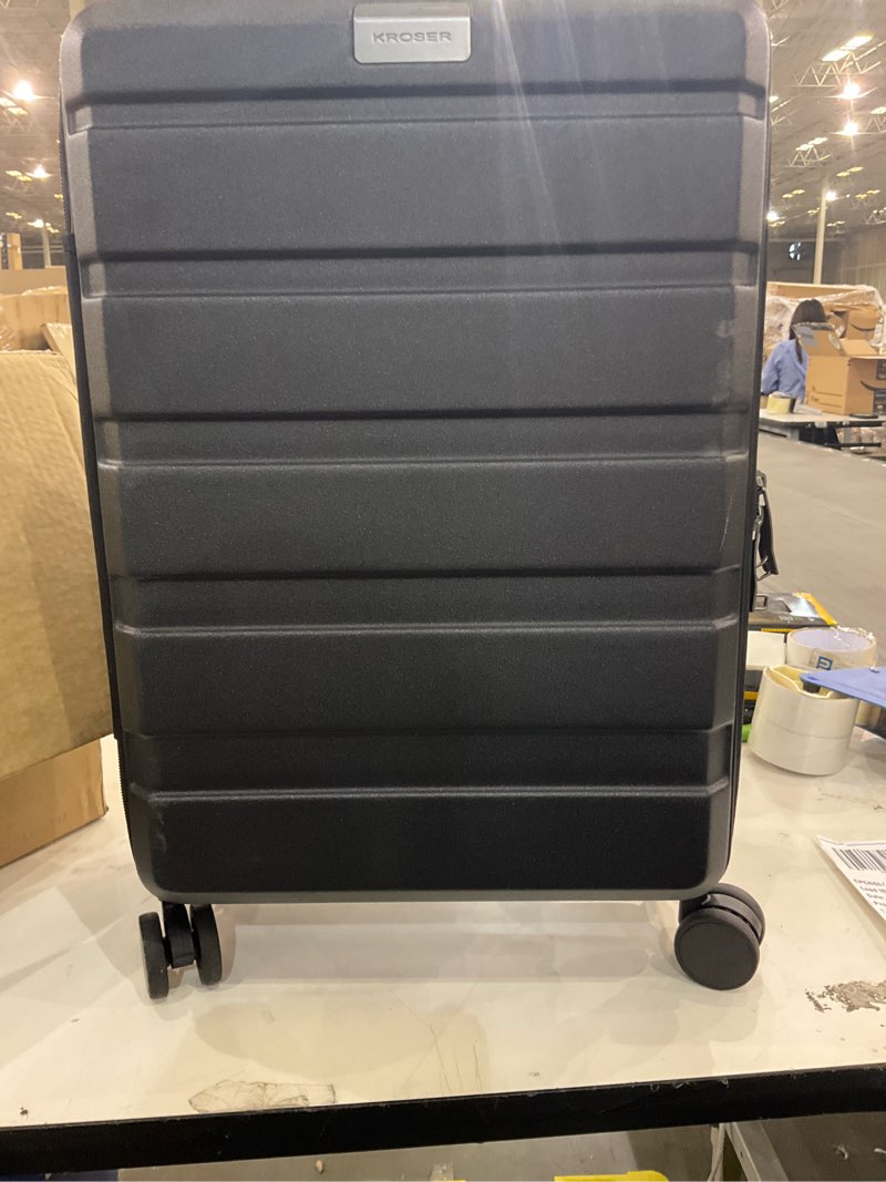 Condition photo showing As Is for KROSER Carry On Luggage with Spinner Wheels & Built-in TSA Lock, Expandable Top Opening Hard Shell Suitcase Large Capacity Durable Rolling Luggage with USB Port, Carry-On 20-Inch, Black