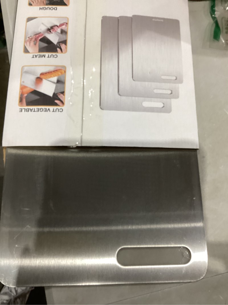 Condition photo showing Good Condition for titanium cutting boards set of 3, 100% pure titanium kitchen cutting board, double-sided non-toxic cutting board, ideal for slicing and dicing meats, features handle, dishwasher safe silver 16"l*10"w(s+m+l)