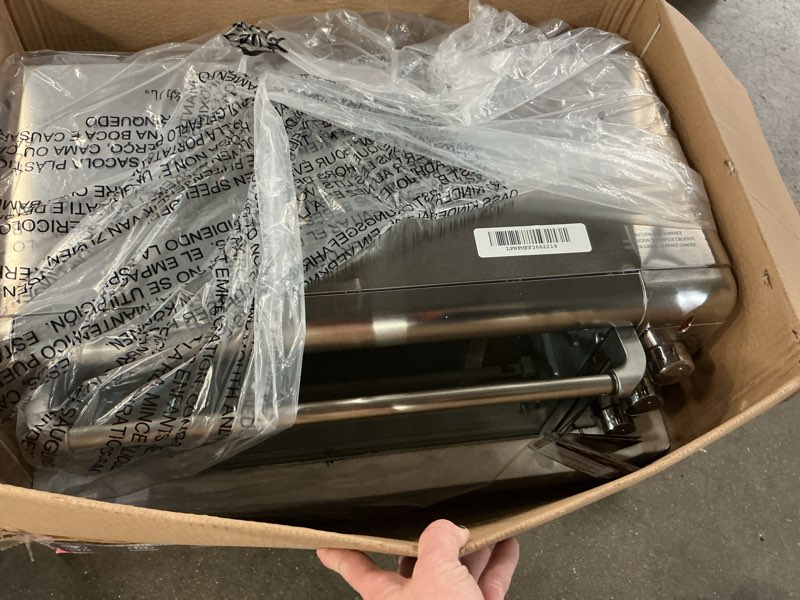 Condition photo showing As Is for BLACK+DECKER Crisp 'N Bake Air Fry Countertop Convection Toaster Oven, XL Capacity, 8-Slice, 5-in-1, Fits 9” x 13” pan,12” Pizza, 60-Min Timer, Bake, Broil, Air Fry, Toast, Keep Warm, Stainless Steel