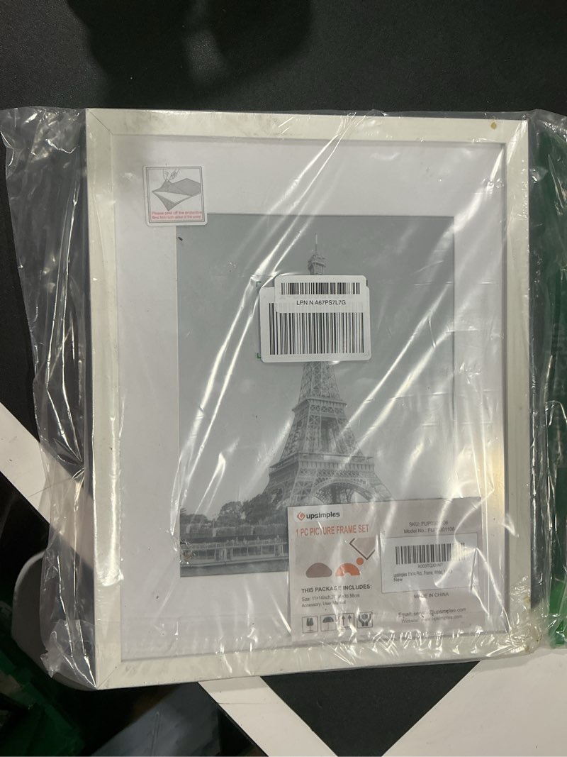 Condition photo showing Good Condition for upsimples 11x14 Picture Frame, Display Pictures 8x10 with Mat or 11x14 Without Mat, Wall Hanging Photo Frame, White, 1 Pack White 11x14
