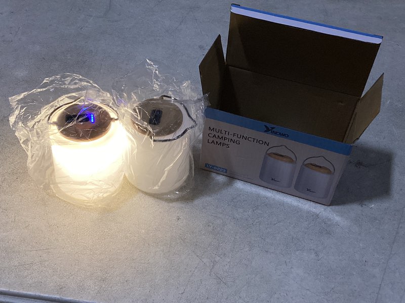 Condition photo showing New/Like New for outdoor portable charging handheld light white