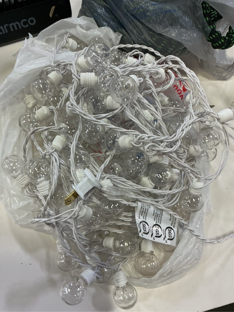 Condition photo showing As Is for harbor breeze 48-ft plug-in white indoor/outdoor string light with 100 white -light led globe bulbs
