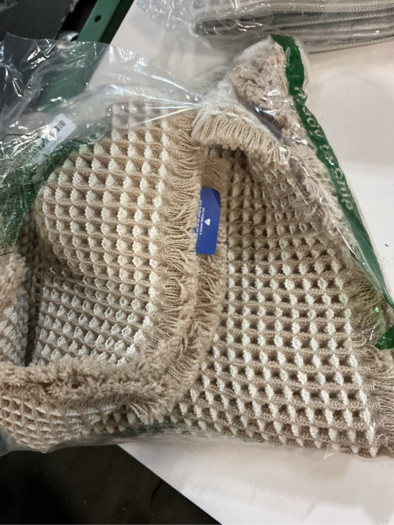 Condition photo showing Good Condition for miulee set of 2 waffle bathroom rugs, boho bath rugs non slip washable, super absorbent bath mats, ultra soft rubber backed shower mats for bathroom floor, tub, brown & white, 17x24 inch brown & white waffle 17''x24''