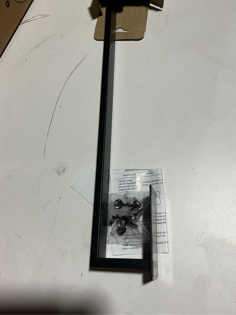 Condition photo showing As Is for LANC Matte Black 24-Inch Bath Towel Rack Self-Adhesive Bathroom Towel Bar for Wall Mounted and Drill Free Towel Rod, Sticky on Kitchen Bathroom Towel Holder Stainless Steel, A8310MB-L6 24 Inche Matte Black