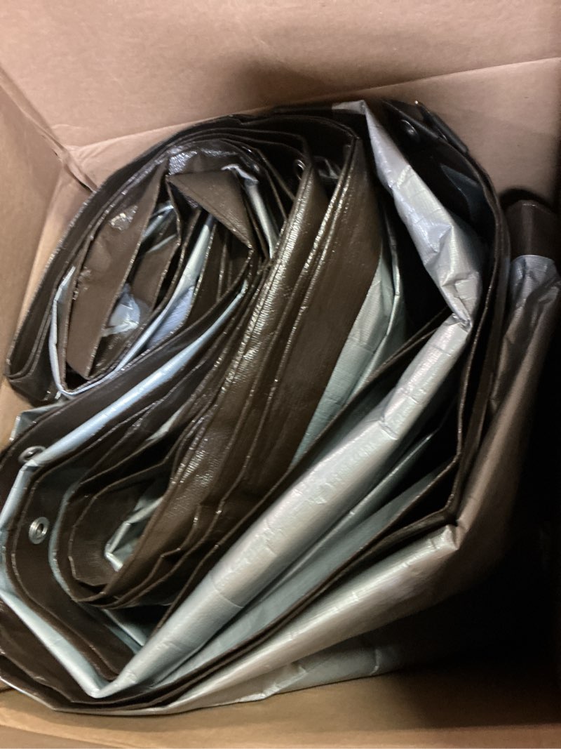 Condition photo showing As Is for Amazon Basics Multi Purpose Waterproof Poly Tarp Cover, 20 X 20 FT, 10MIL Thick, Brown/Silver, 1-Pack