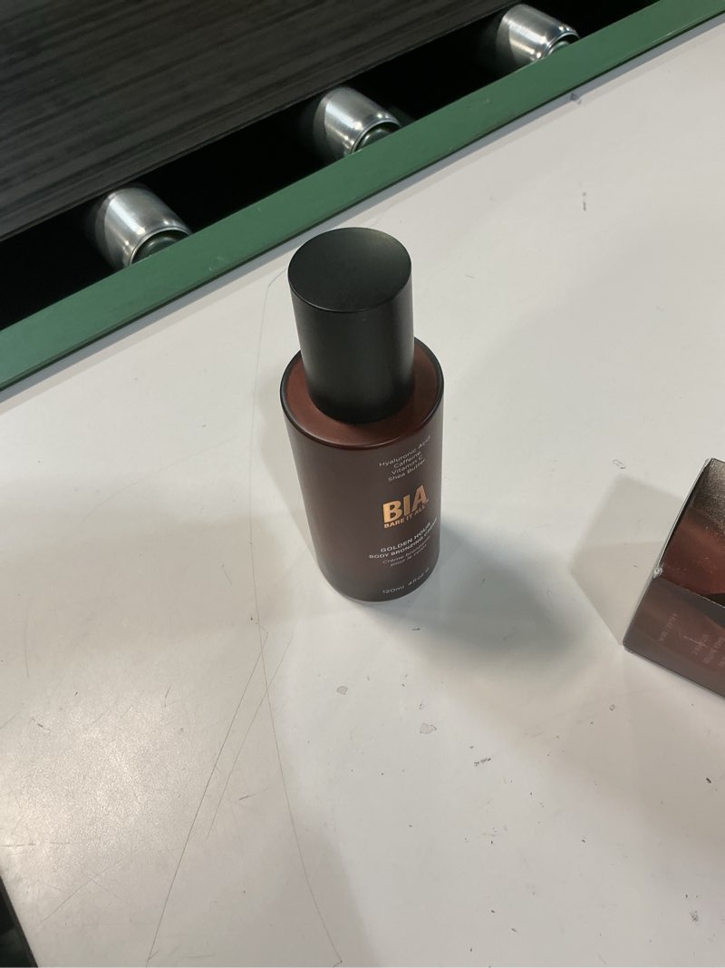 Condition photo showing Good Condition for bare it all golden hour bronzing cream smoothing age defying body bronzer long lasting natural glow 