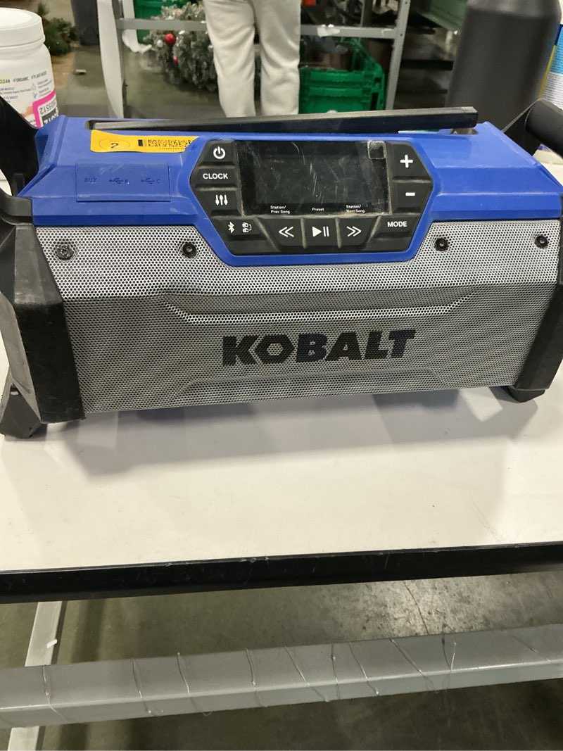 Condition photo showing As Is for Kobalt 24-volt Water Resistant Cordless Bluetooth Jobsite radio (missing parts)