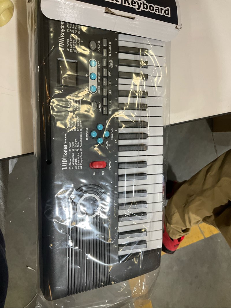 Condition photo showing As Is for 61 key keyboard piano,portable electronic digital piano,built in dual speakers,external microphone,power plug,rich teaching content,multi-functional electronic piano suitable for beginners kkek5 black