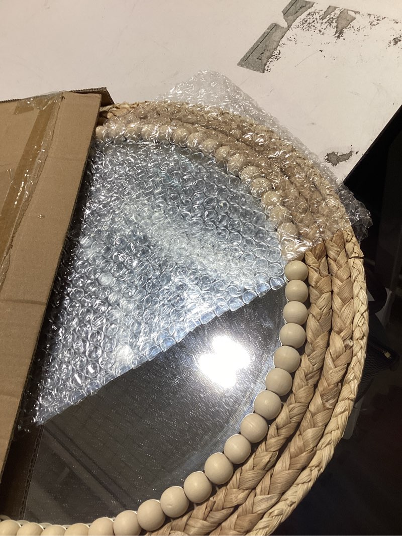 Condition photo showing As Is for SWTHONY 15 Inch Boho Round Hanging Wall Mirror Decorative Rattan Circle Mirrors for Farmhouse, Living Room, Bedroom