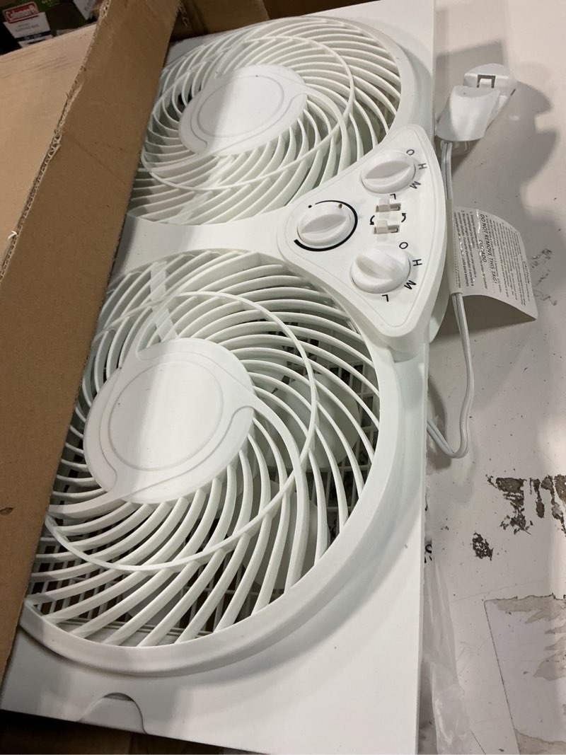 Condition photo showing As Is for Amazon Basics Window Fans for Home Bedroom, Twin Heads, Cooling Airflow, Exhaust, Expandable Side Panel Manual Control, 3 Speeds, 63W, 9 inch, White