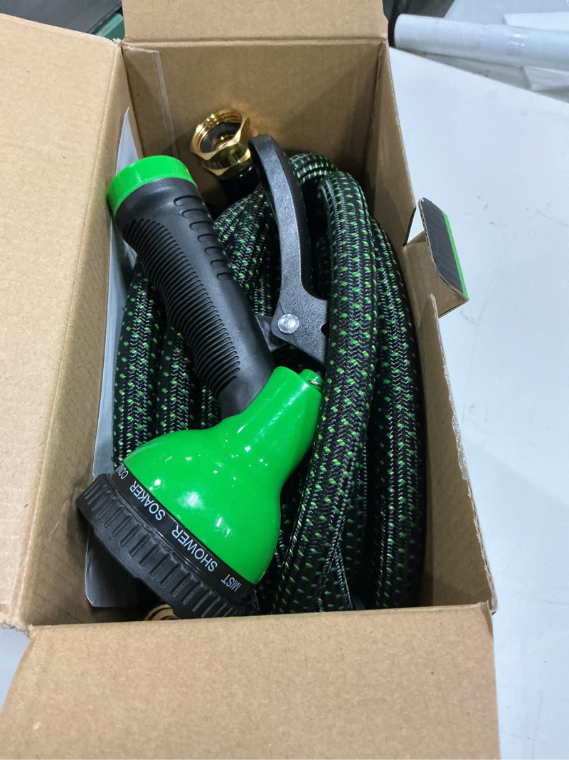Condition photo showing Good Condition for garden hose 50ft, non-expanding water hose, lightweight, kink free, sturdy, leak-proof, portable, flexible hose with 10 function nozzle for outdoor, yard, lawn, car wash and camper use green 50ft
