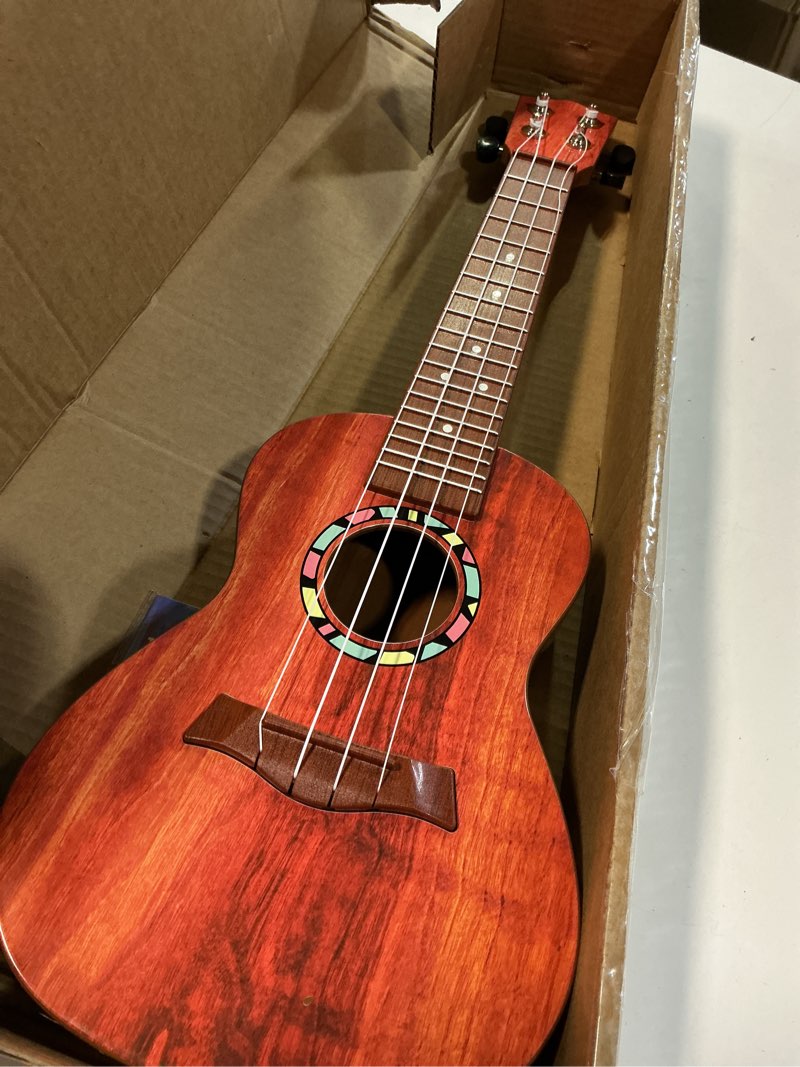 Condition photo showing Good Condition for raimy kids guitar ukulele - 21in ukulele guitar toys for kids ages 3 4 5 6 7+ year old boys girls simulated sound quality music instruments learning education (brown) rosewood