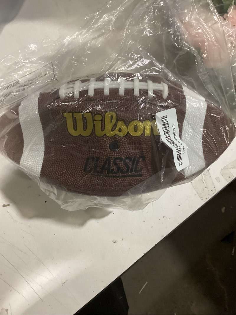 Condition photo showing As Is for WILSON NCAA Official Football