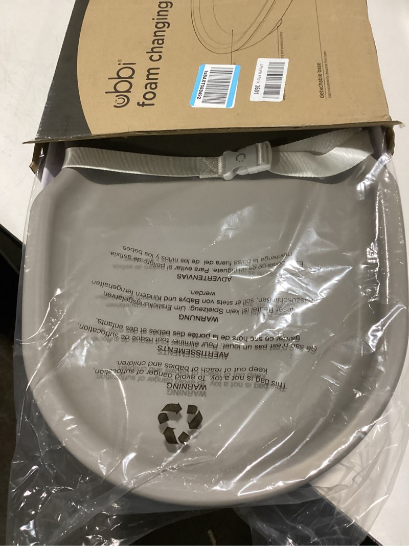 Condition photo showing Good Condition for Ubbi Baby Changing Pad, Easy to Clean with Detachable Base, Lightweight, Waterproof Foam, Includes Safety Strap and Non-Skid Feet, Taupe Foam Changing Pad, Taupe
