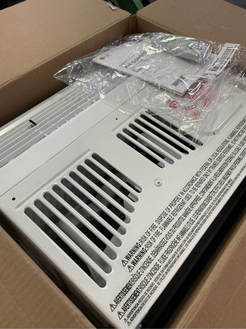 Condition photo showing Good Condition for lg 6,000 btu window air conditioner, 115v, cools 250 sq.ft. for bedroom, den, living room, quiet operation, with remote, 2 cooling & fan speeds, 2-way air deflection, auto restart, white 6000 btu electronic & standard white