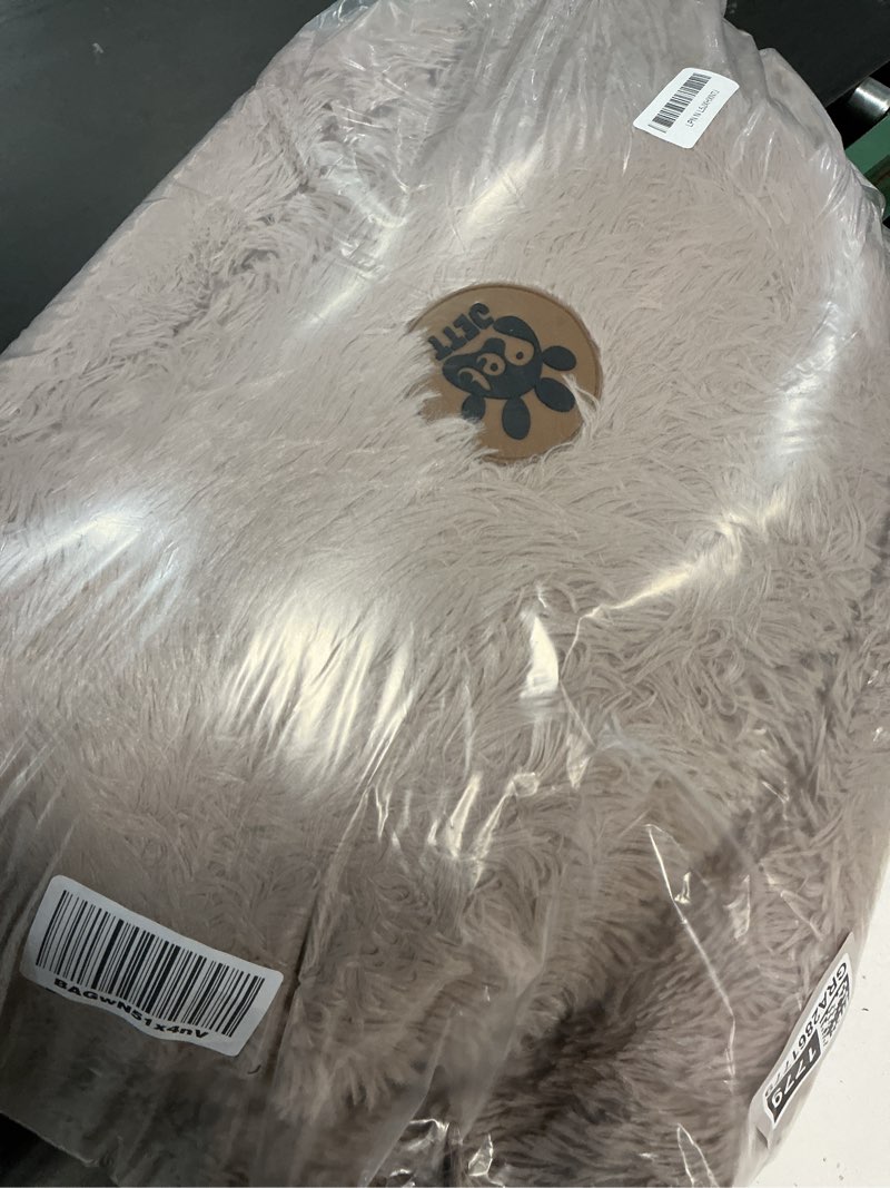 Condition photo showing Good Condition for PetJett Calming Large Dog Bed - 36'' Donut Dog Beds, Anti-Slip & Washable Large Round Bed, Fluffy Faux Fur Pet Bed, Super Soft Anti-Anxiety Premium Comfort Bed, Fits Dogs up to 100 lbs - Beige Beige Large - 36”L x 36”W x 10”Th