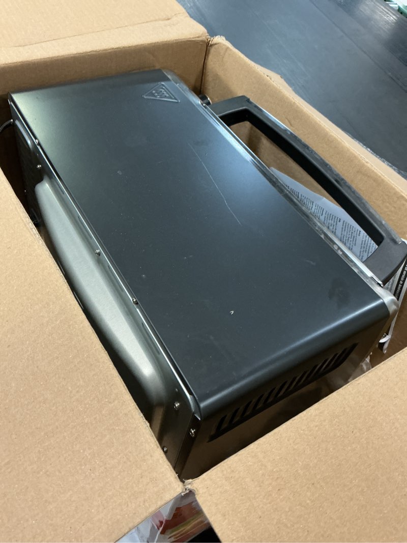 Condition photo showing As Is for black+decker to1313sbd toaster oven, 15.47 inch, silver