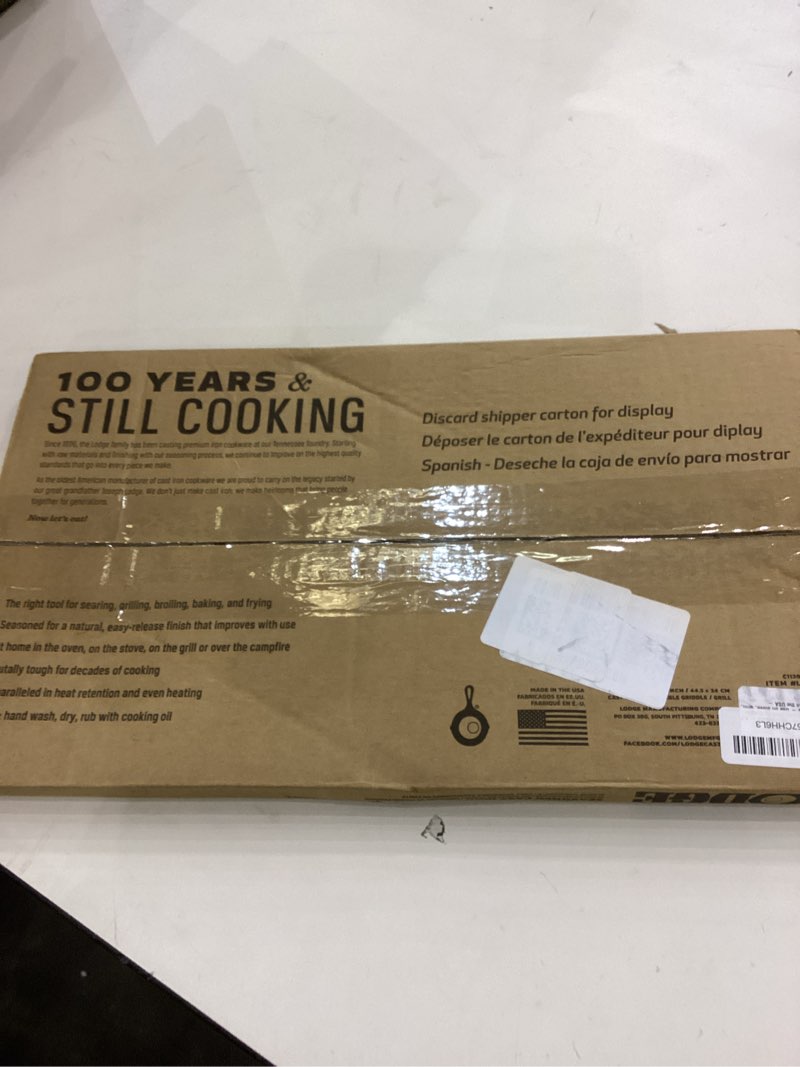 Condition photo showing New/Like New for Lodge Reversible Cast Iron Grill/Griddle – 9.5 x 16.75 Inch Pre-Seasoned Cooking Surface – Flat & Ribbed Sides – Use on Stove, Grill, or Campfire – Made in the USA – Heavy-Duty, Black 16.8" x 9.5" x 0.6" Double Burner Grill