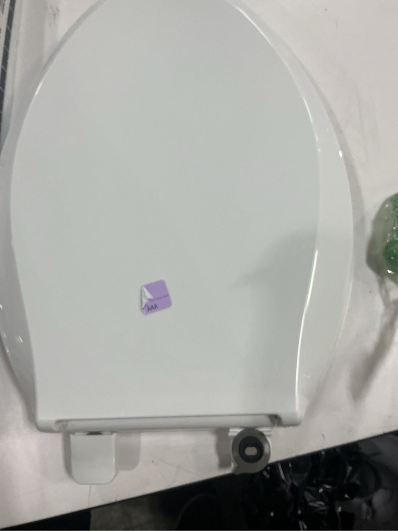 Condition photo showing As Is for KOHLER 4636-RL-0 Cachet ReadyLatch Elongated Toilet Seat Slow Close, Soft Close Toilet Seat Quiet Lid, Contoured Grip-Tight Bumpers Installation Hardware, Apartment Essentials, White White Elongated Ready Latch